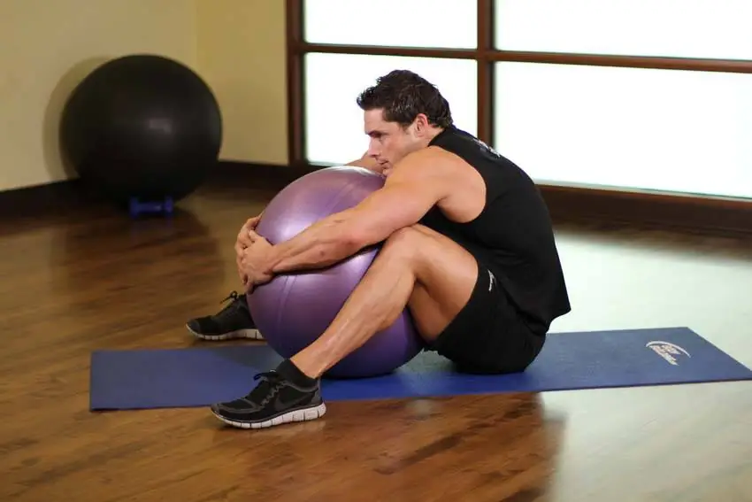 Squeeze The Swiss Orb For Spinal Bliss